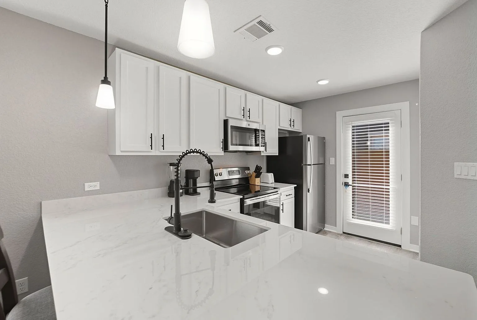 Kitchen island quartz close, 20 Tate Lane, Round Rock