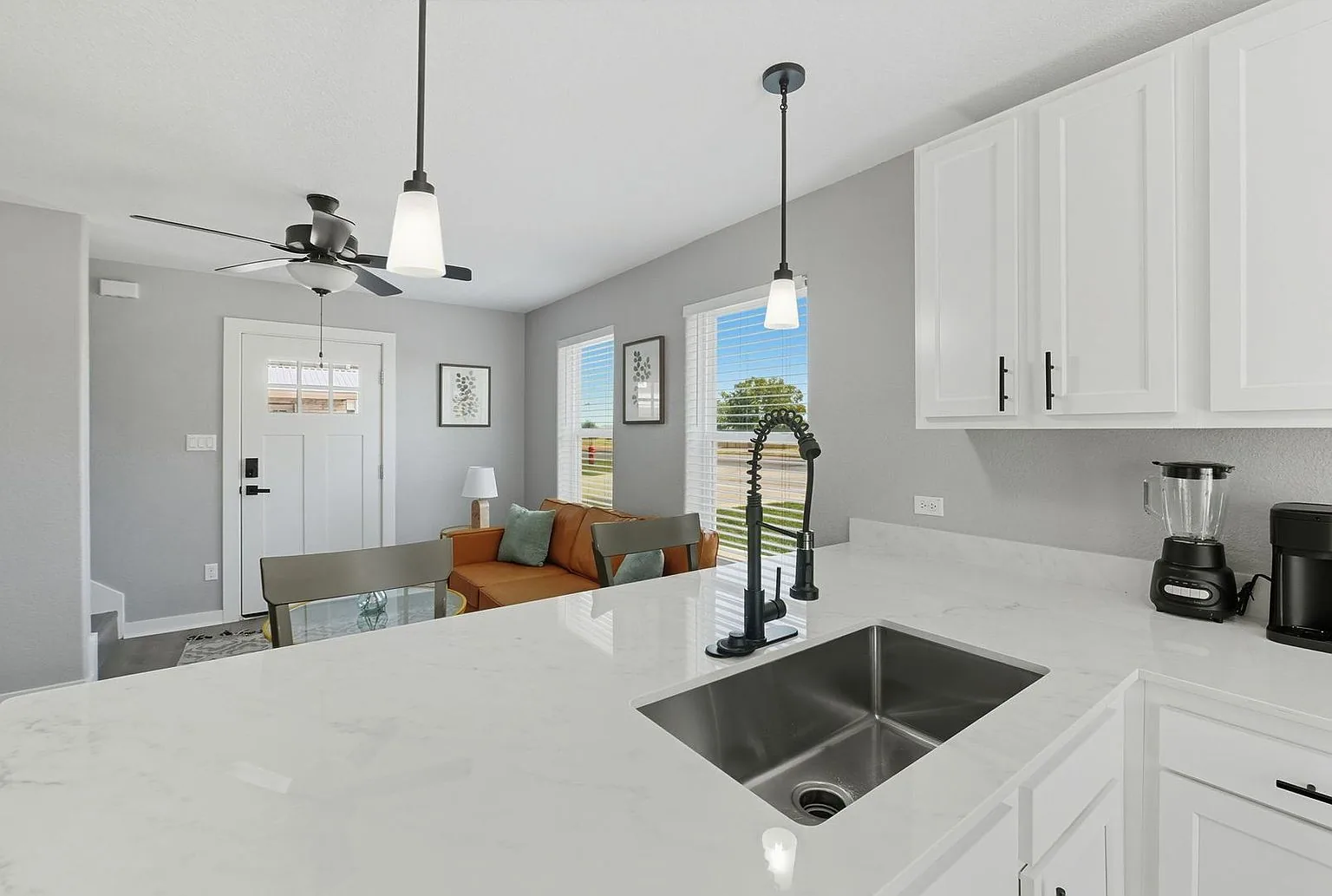 Kitchen sink toward living, 20 Tate Lane, Round Rock