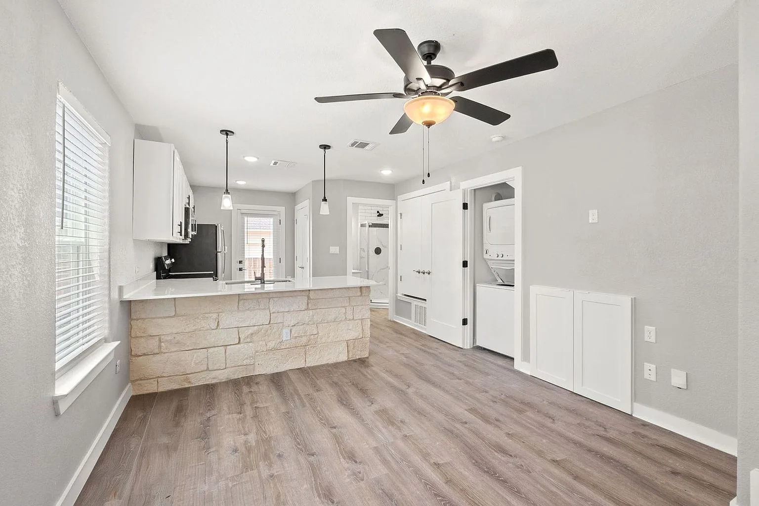 Kitchen stone island from living, 20 Tate Lane, Round Rock