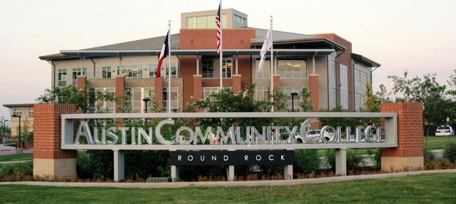 The Austin Community College Round Rock campus sign in front of the main building